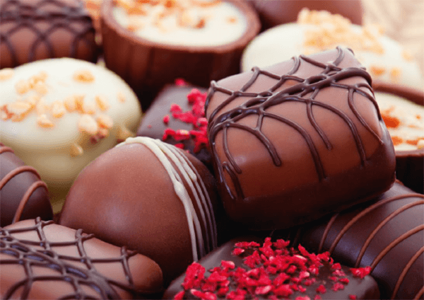 Flat flex conveyor belts for chocolate enrobing machine